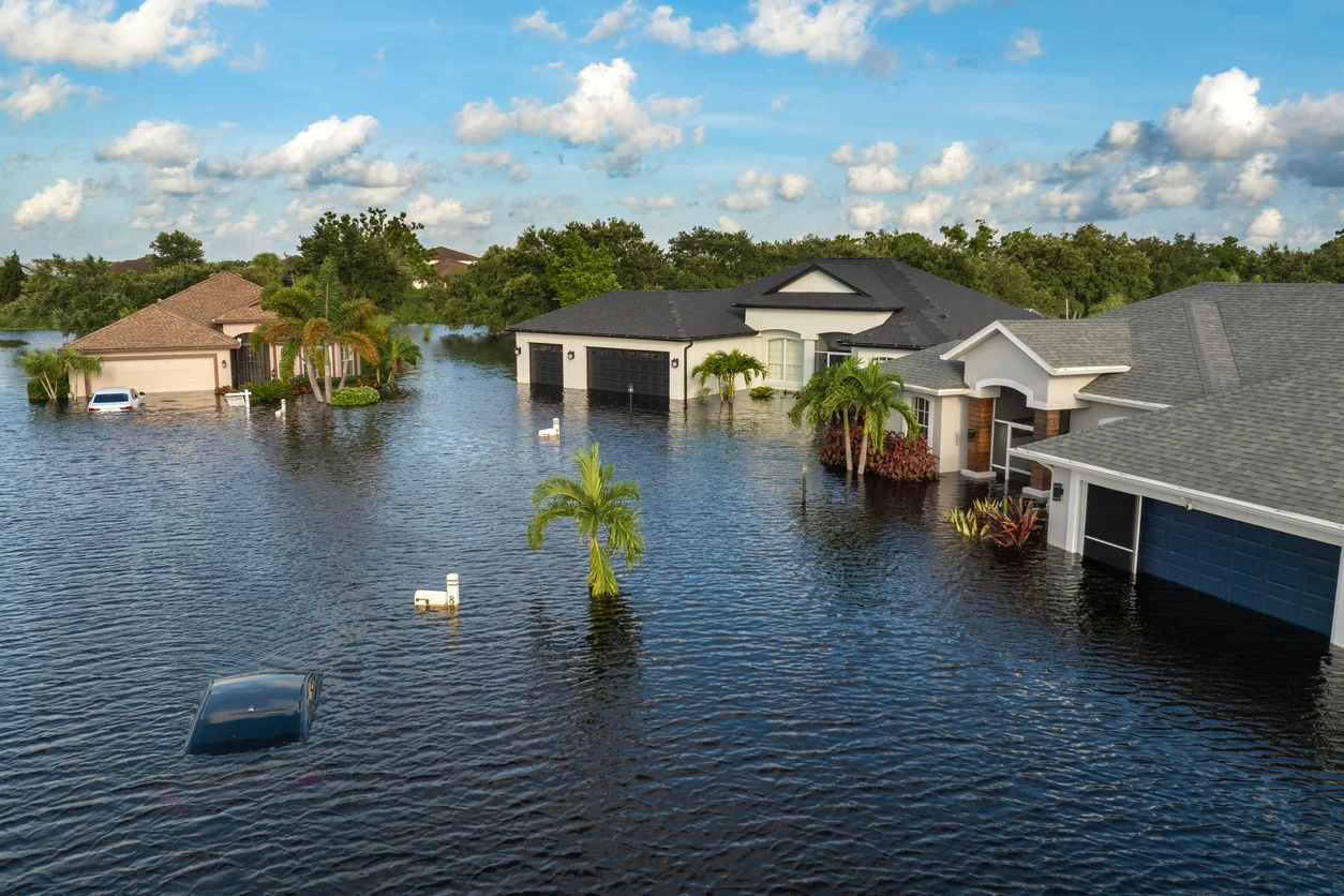 An image of a highly flooded area that represents rising floodwaters and flood damage insurance disputes handled by Trident Law HQ