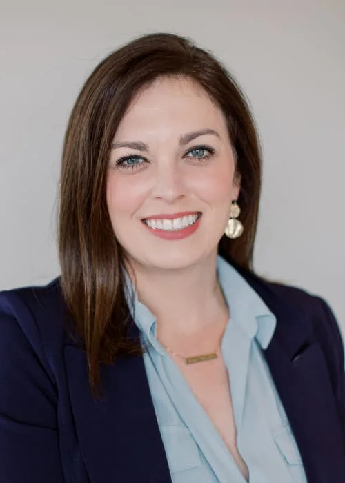 High-quality professional headshot of Heidi Dilorenzo, an attorney who works as co-counsel for Trident Law HQ, posed in front of a solid color backdrop.